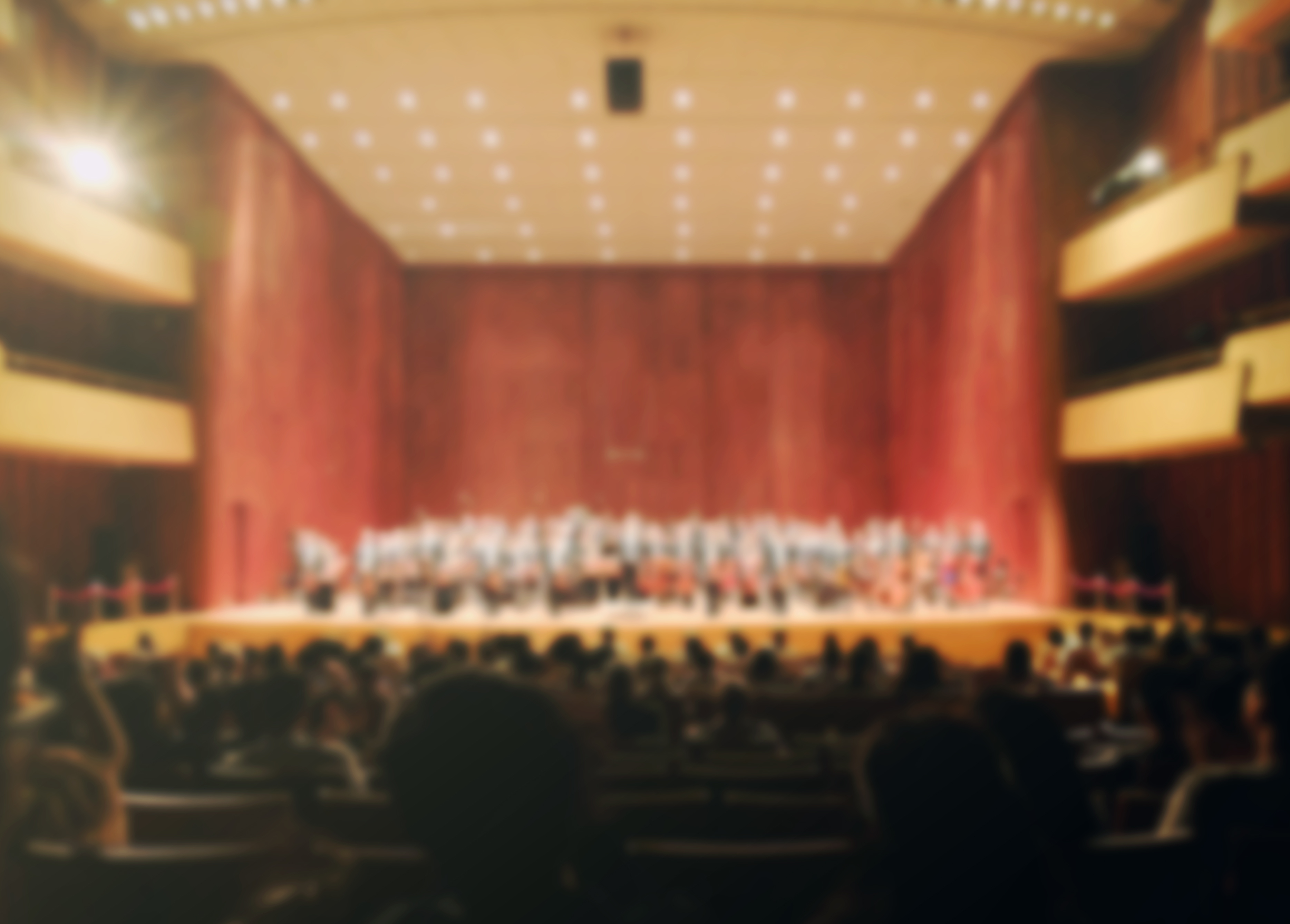 Blurred background of audiences in orchestra symphony hall